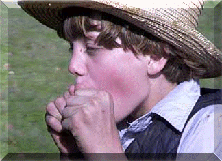 Amish Boy Eating